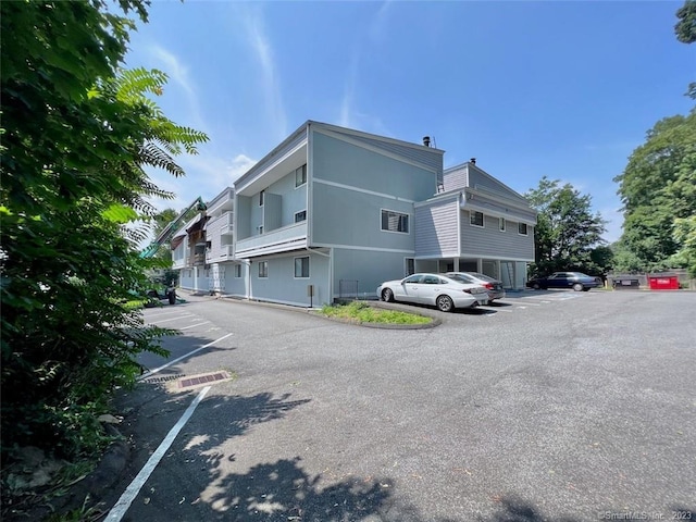 296 Main Ave Unit 1, Norwalk, CT 06851 - view of building exterior with uncovered parking
