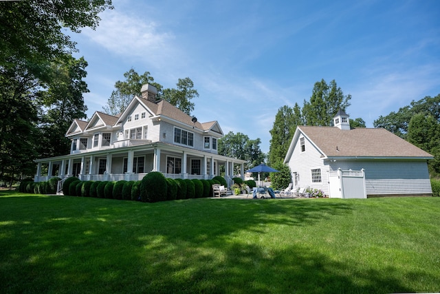 206 Fox Hopyard Rd, East Haddam, CT 06423 - rear view of house featuring a yard and a chimney