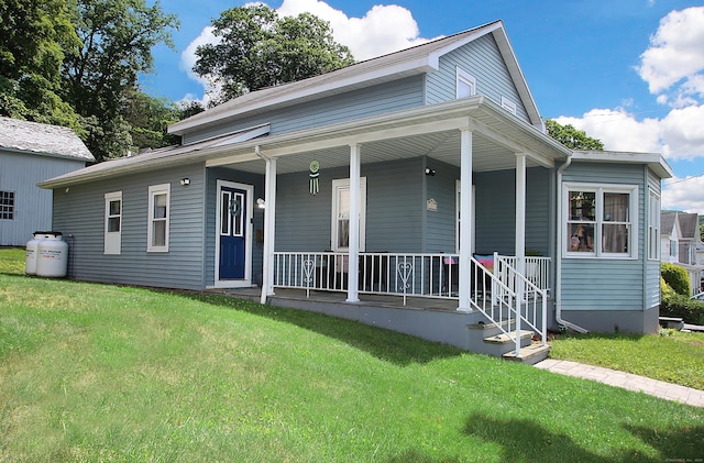 58 Litchfield St, Thomaston, CT 06787 - bungalow-style home with a porch and a front lawn
