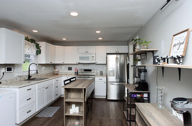 58 Litchfield St, Thomaston, CT 06787 - kitchen featuring appliances with stainless steel finishes, open shelves, butcher block countertops, white cabinets, and recessed lighting