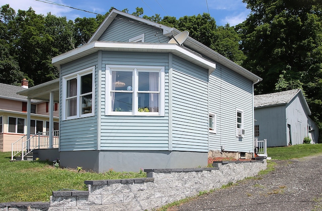 58 Litchfield St, Thomaston, CT 06787 - view of home's exterior featuring cooling unit
