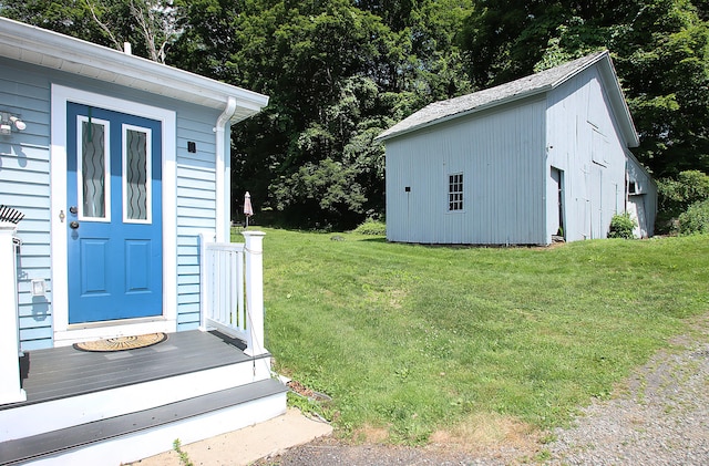 58 Litchfield St, Thomaston, CT 06787 - view of green lawn featuring an outbuilding and view of scattered trees