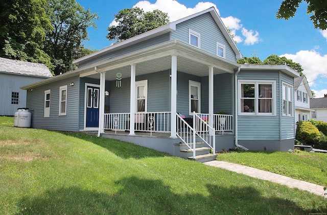 58 Litchfield St, Thomaston, CT 06787 - view of front of house featuring a front lawn and a porch