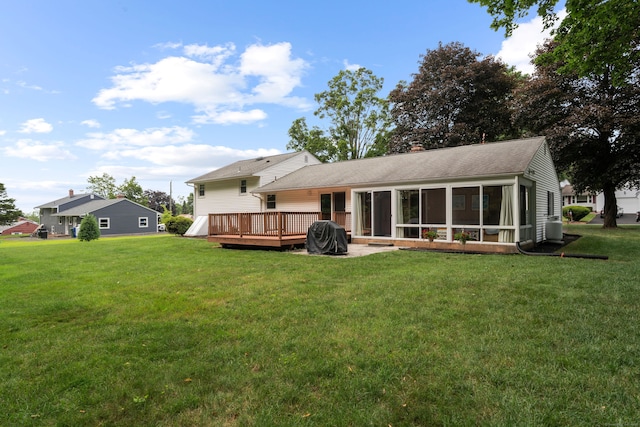 29 Jeffrey Dr, Wallingford, CT 06492 - back of house with a wooden deck, a lawn, a sunroom, and roof with shingles