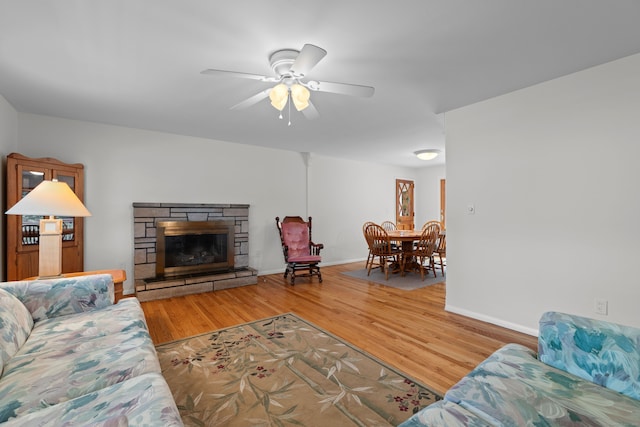 29 Jeffrey Dr, Wallingford, CT 06492 - living area featuring wood finished floors, a ceiling fan, and a fireplace