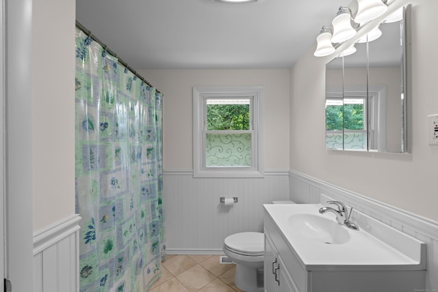 29 Jeffrey Dr, Wallingford, CT 06492 - bathroom featuring a wainscoted wall, healthy amount of natural light, vanity, tile patterned floors, and curtained shower