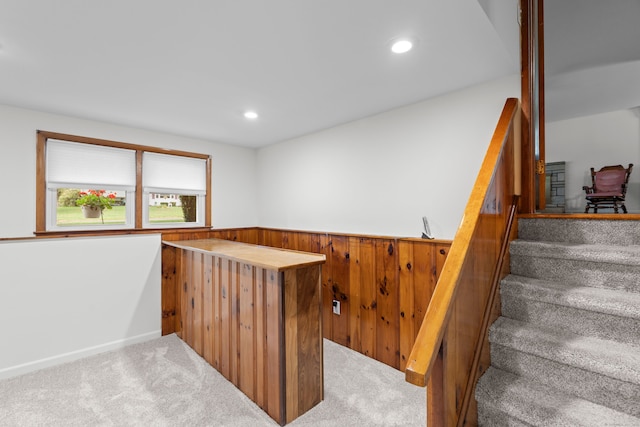29 Jeffrey Dr, Wallingford, CT 06492 - stairs featuring a bar, carpet flooring, recessed lighting, wainscoting, and wood walls