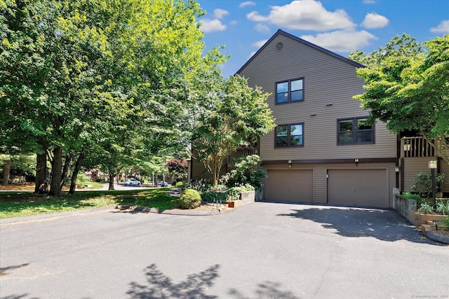 16 Juniper Cir Unit 16, Monroe, CT 06468 - view of front of home featuring an attached garage and driveway