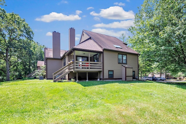 16 Juniper Cir Unit 16, Monroe, CT 06468 - back of house featuring stairs, a chimney, a deck, and a yard