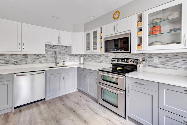 16 Juniper Cir Unit 16, Monroe, CT 06468 - kitchen featuring stainless steel appliances, gray cabinetry, and light countertops