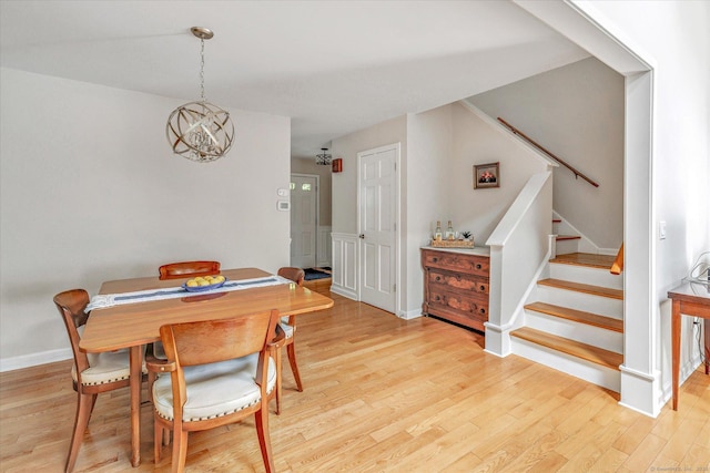 16 Juniper Cir Unit 16, Monroe, CT 06468 - dining room featuring stairs, light wood-type flooring, and a chandelier