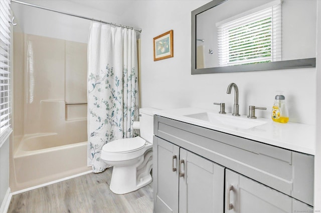 16 Juniper Cir Unit 16, Monroe, CT 06468 - full bathroom with wood finished floors, shower / tub combo with curtain, and vanity