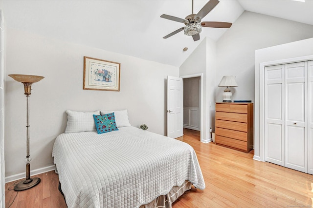 16 Juniper Cir Unit 16, Monroe, CT 06468 - bedroom featuring light wood-style flooring, high vaulted ceiling, a closet, and ceiling fan