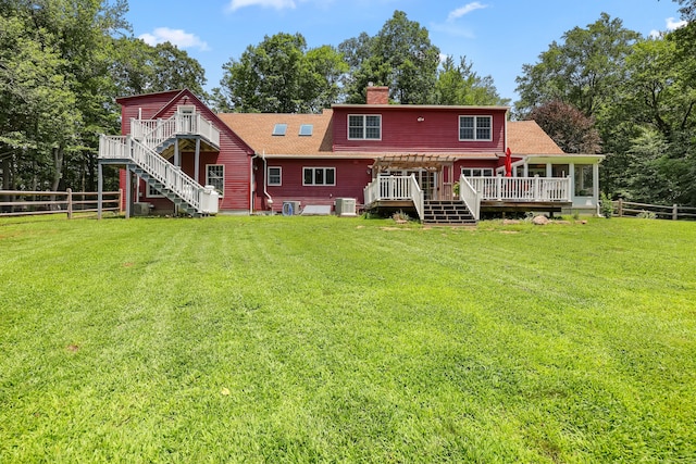 39 Beebe Rd, East Haddam, CT 06423 - back of house featuring a deck, stairway, a chimney, and a fenced backyard