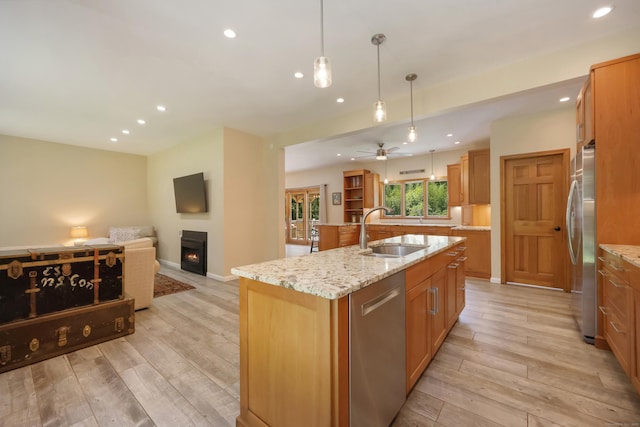 39 Beebe Rd, East Haddam, CT 06423 - kitchen featuring stainless steel appliances, recessed lighting, open floor plan, light wood-type flooring, and an island with sink