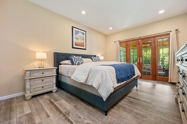 39 Beebe Rd, East Haddam, CT 06423 - bedroom with french doors, access to outside, wood finished floors, and recessed lighting