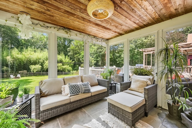 39 Beebe Rd, East Haddam, CT 06423 - sunroom featuring an outdoor living space and view of wooded area
