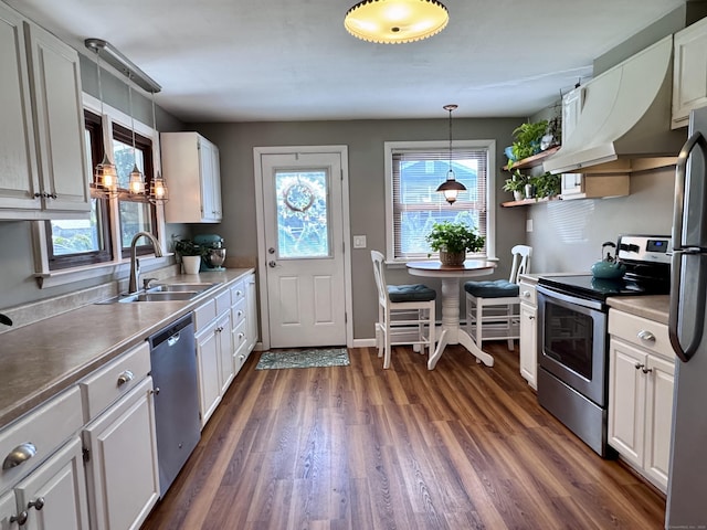 44 Coolidge St, Windsor Locks, CT 06096 - kitchen featuring appliances with stainless steel finishes, white cabinetry, and dark wood-style flooring