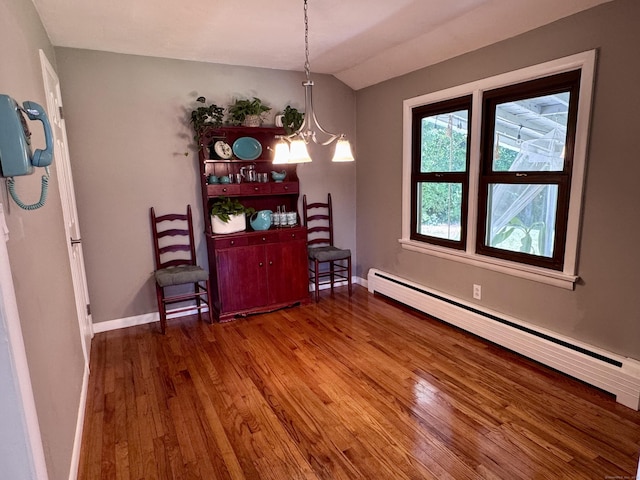 44 Coolidge St, Windsor Locks, CT 06096 - dining area with a baseboard heating unit, wood finished floors, a chandelier, and lofted ceiling