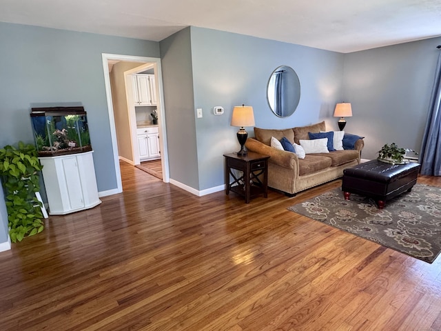 44 Coolidge St, Windsor Locks, CT 06096 - living room with wood finished floors and baseboards