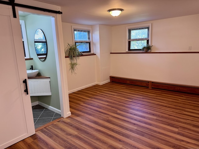 44 Coolidge St, Windsor Locks, CT 06096 - empty room featuring wood finished floors and baseboards