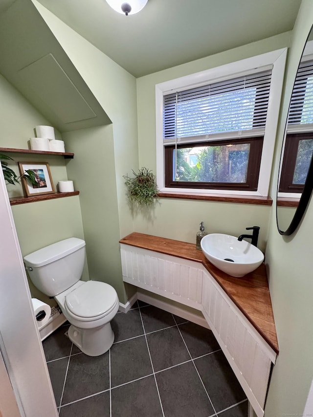44 Coolidge St, Windsor Locks, CT 06096 - bathroom with a sink and tile patterned floors