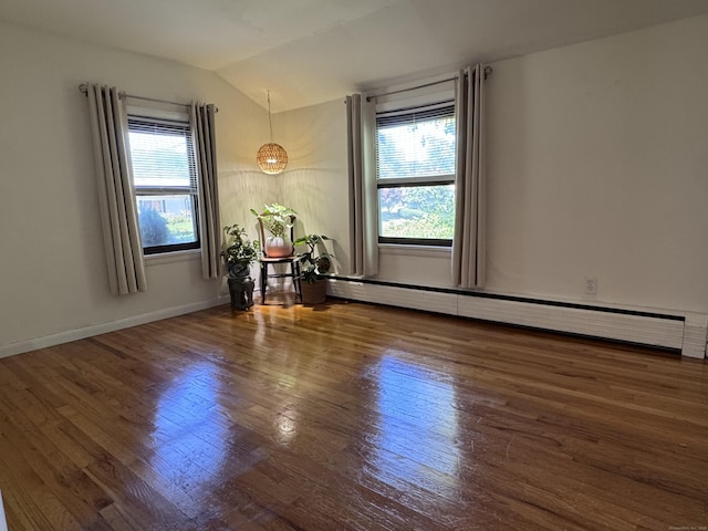 44 Coolidge St, Windsor Locks, CT 06096 - unfurnished room featuring baseboard heating, vaulted ceiling, and wood finished floors
