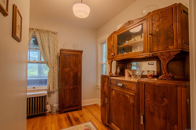 23 E St, Stafford, CT 06076 - office with radiator heating unit and light wood-style flooring