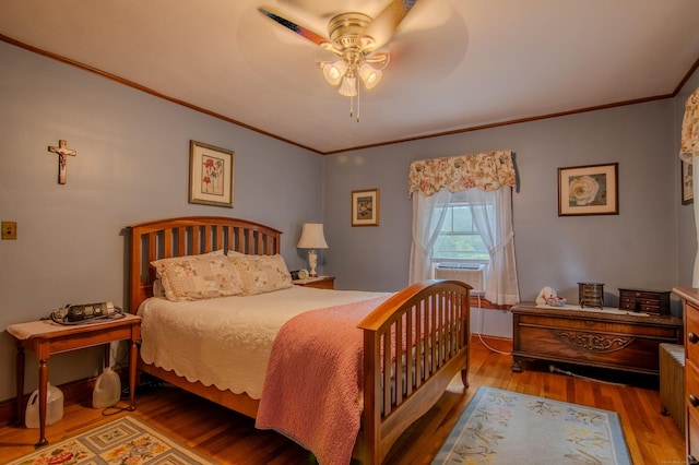 23 E St, Stafford, CT 06076 - bedroom with wood finished floors, crown molding, a ceiling fan, and cooling unit