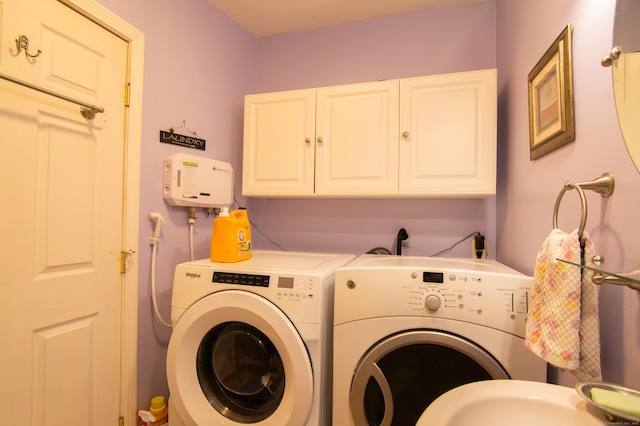 23 E St, Stafford, CT 06076 - washroom with separate washer and dryer and cabinet space