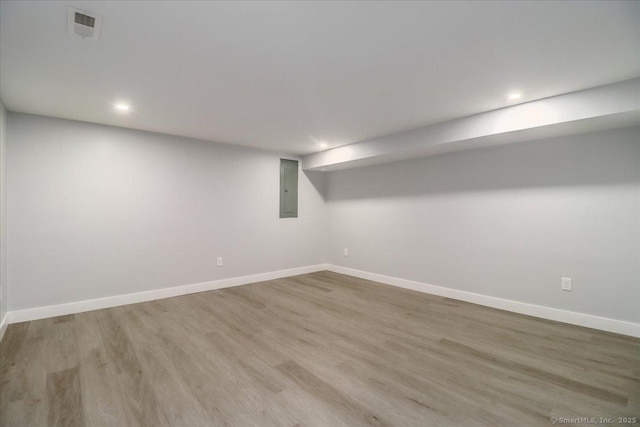 12 Deer Run Rd, Brookfield, CT 06804 - finished basement with electric panel, wood finished floors, and recessed lighting
