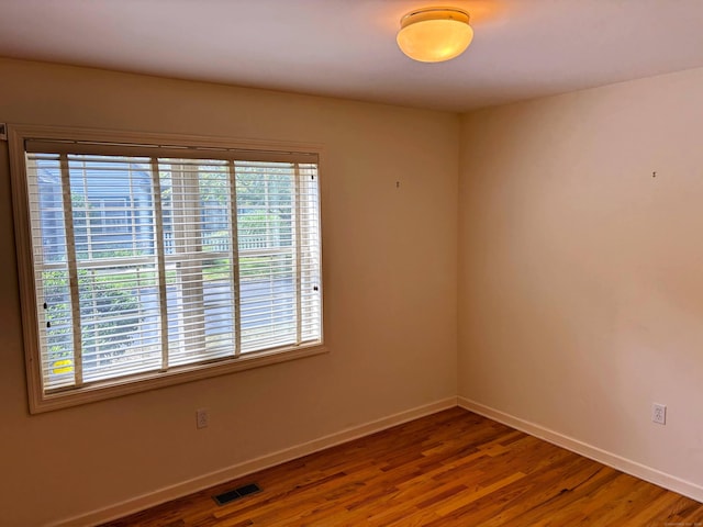 2 Apple Blossom Ln, East Lyme, CT 06357 - unfurnished room with plenty of natural light and wood finished floors
