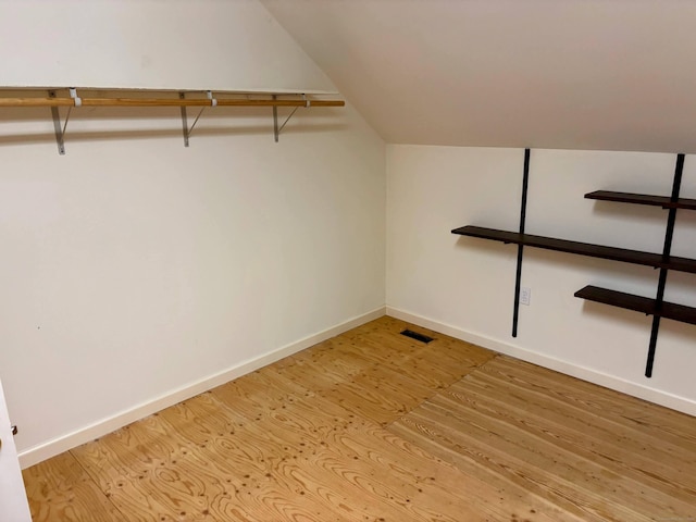 2 Apple Blossom Ln, East Lyme, CT 06357 - spacious closet with wood finished floors and lofted ceiling
