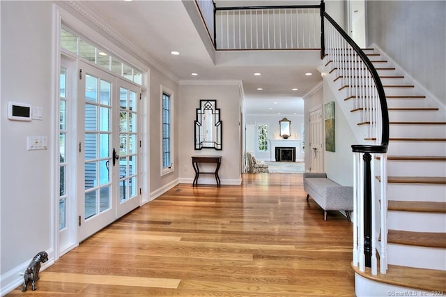 30 Soundview Farm Rd, Weston, CT 06883 - entryway featuring ornamental molding, stairs, light wood-style floors, french doors, and recessed lighting