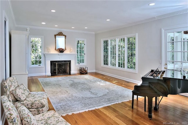 30 Soundview Farm Rd, Weston, CT 06883 - living room with a fireplace, wood finished floors, recessed lighting, and ornamental molding