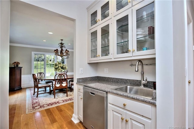30 Soundview Farm Rd, Weston, CT 06883 - kitchen with dishwasher, light wood finished floors, crown molding, white cabinetry, and a chandelier