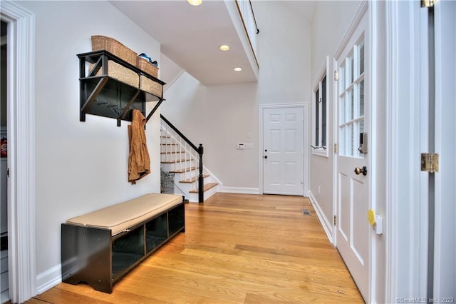 30 Soundview Farm Rd, Weston, CT 06883 - foyer featuring stairs, light wood-style floors, and recessed lighting