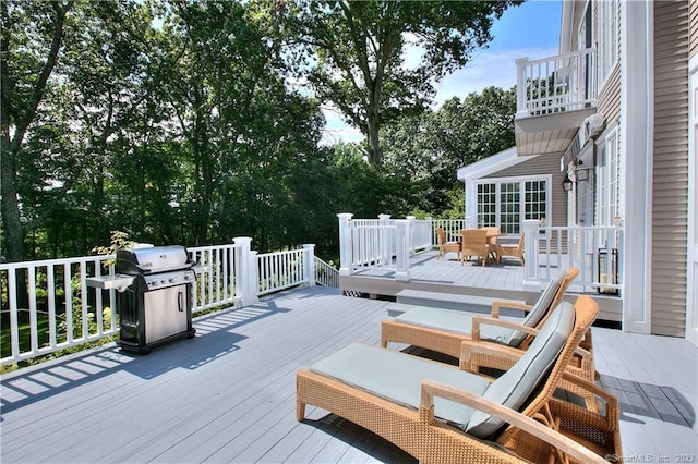 30 Soundview Farm Rd, Weston, CT 06883 - wooden terrace with a grill, outdoor dining space, and view of scattered trees