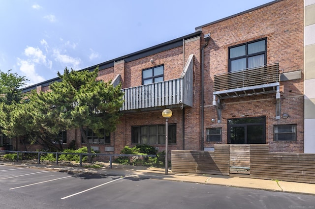 149 Water St Apt 15, Norwalk, CT 06854 - view of building exterior featuring uncovered parking