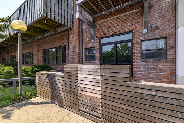 149 Water St Apt 15, Norwalk, CT 06854 - view of side of property featuring a balcony and brick siding