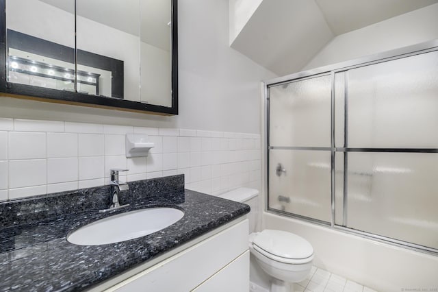 149 Water St Apt 15, Norwalk, CT 06854 - full bath featuring vanity, shower / bath combination with glass door, and tile walls