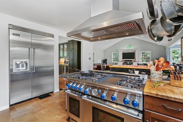 101 Golden Hill St, Trumbull, CT 06611 - kitchen with high quality appliances, wall chimney exhaust hood, lofted ceiling, open floor plan, and butcher block countertops