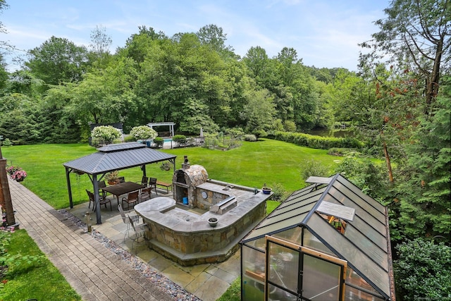 101 Golden Hill St, Trumbull, CT 06611 - wooden deck with a gazebo, a greenhouse, a patio area, and a lawn