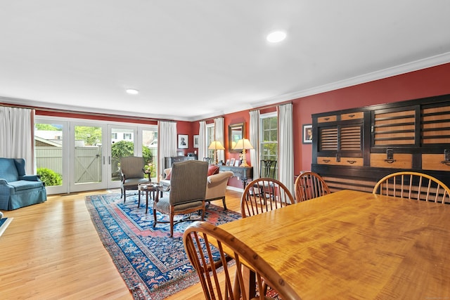 312 Elm St Apt 9, New Canaan, CT 06840 - dining room featuring ornamental molding, healthy amount of natural light, light wood-type flooring, french doors, and recessed lighting
