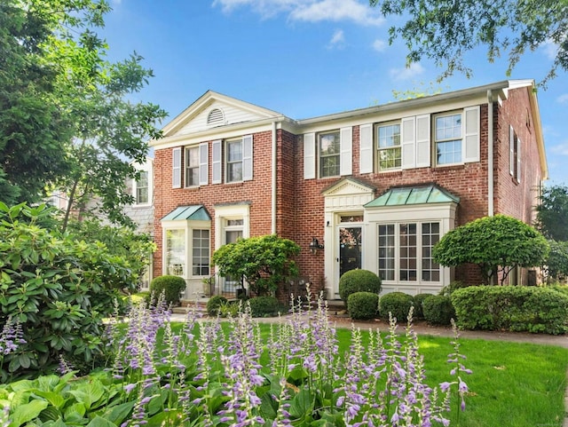 312 Elm St Apt 9, New Canaan, CT 06840 - view of front facade featuring brick siding