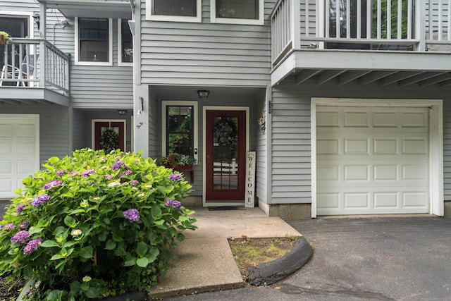 34 Village View Ter Unit 34, Meriden, CT 06451 - property entrance with an attached garage and a balcony