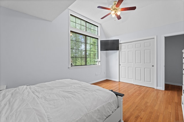 34 Village View Ter Unit 34, Meriden, CT 06451 - bedroom featuring vaulted ceiling, a closet, light wood finished floors, and ceiling fan