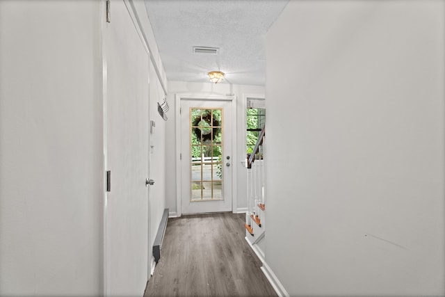 34 Village View Ter Unit 34, Meriden, CT 06451 - hallway with a textured ceiling and wood finished floors