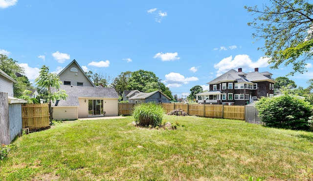 169 Mount Pleasant St, Norwich, CT 06360 - fenced backyard featuring a storage shed and a patio