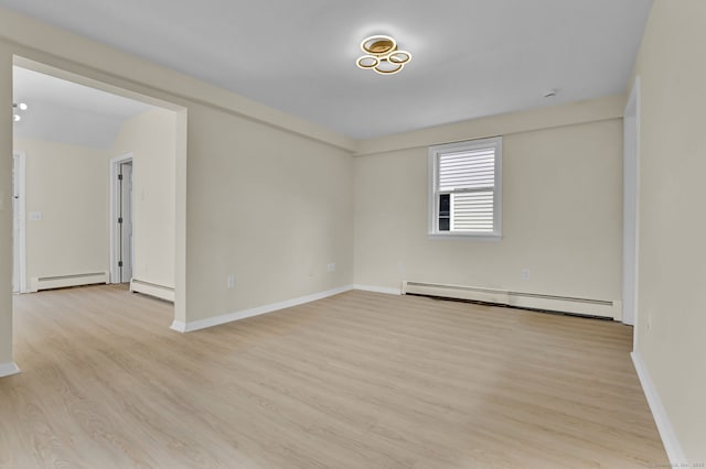 169 Mount Pleasant St, Norwich, CT 06360 - empty room with baseboard heating, a baseboard radiator, and light wood finished floors